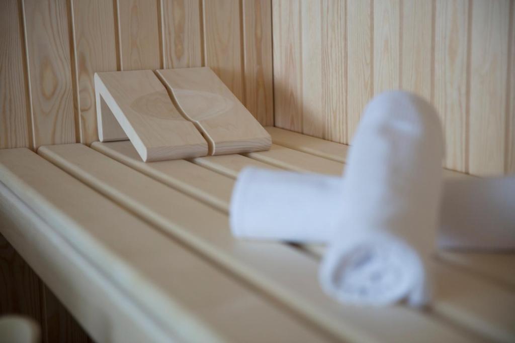 a close up of a table with a box and paper at Hotel Waldegg - Adults only in Engelberg
