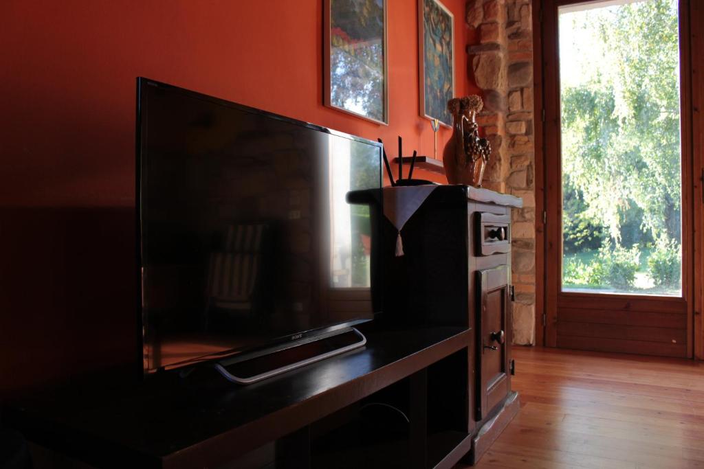 TV a/nebo společenská místnost v ubytování Casa Vacanza Pratolungo