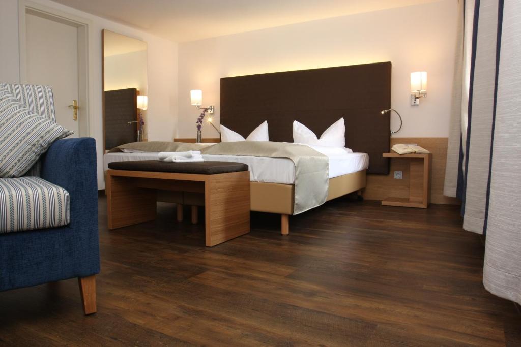 Postel nebo postele na pokoji v ubytování Altstadt-Hotel Passau