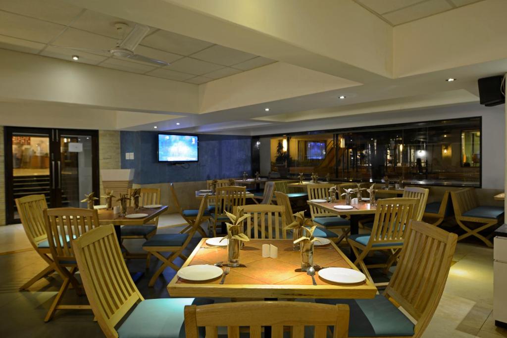 Restaurace v ubytování GCC Hotel and Club