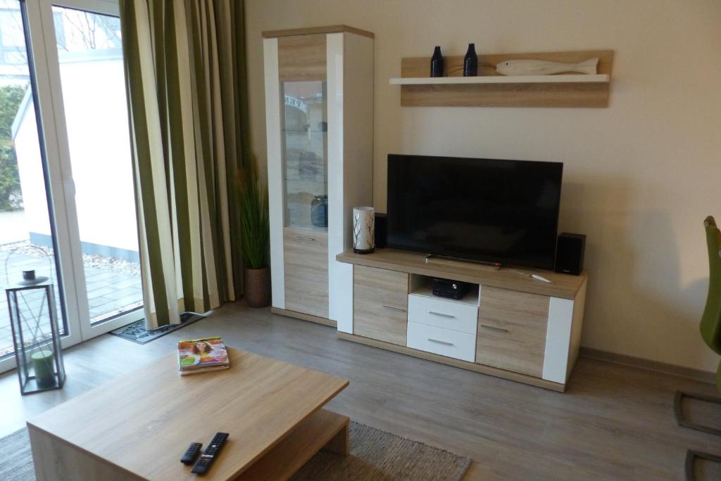 TV a/nebo společenská místnost v ubytování Haus Baltic Cube