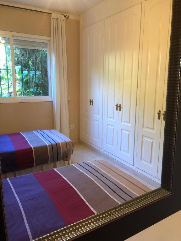Postel nebo postele na pokoji v ubytování Marbella Elviria