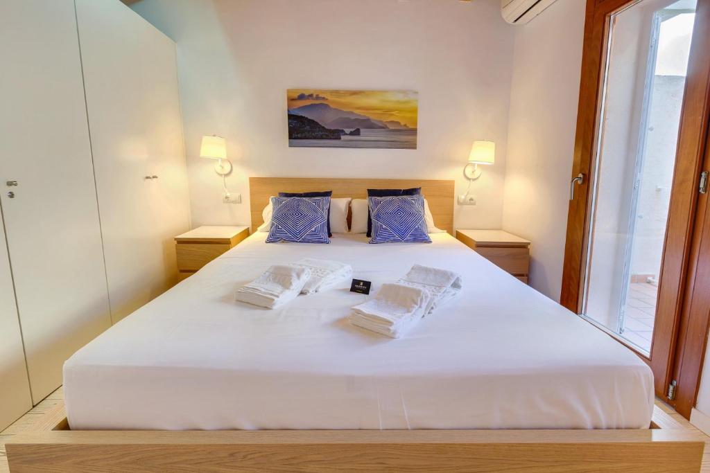 Giường trong phòng chung tại Urban Suites Palma - Turismo de Interior