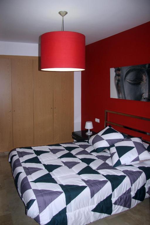 Posteľ alebo postele v izbe v ubytovaní Holiday Apartments Malvarrosa Beach