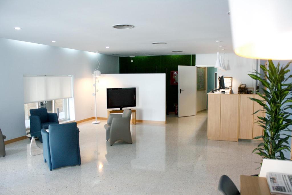 TV a/nebo společenská místnost v ubytování Hotel Universal Murcia