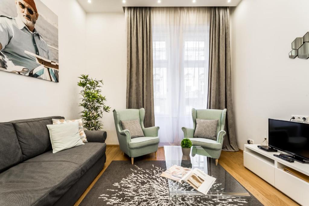 TV a/nebo společenská místnost v ubytování Hello Downtown Apartment - Movie
