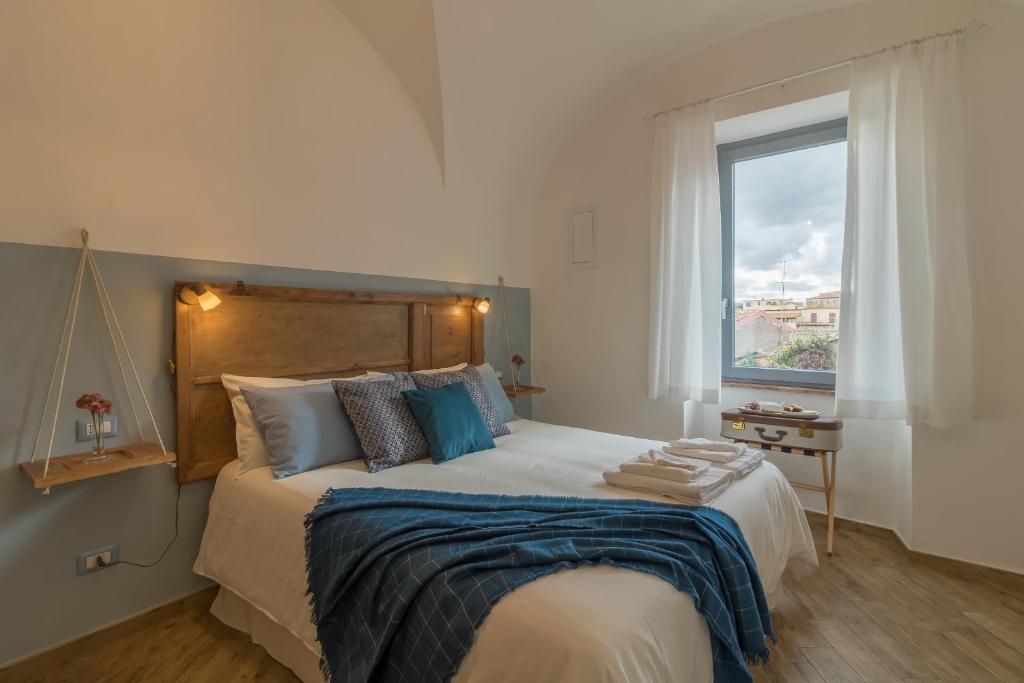 Postel nebo postele na pokoji v ubytování Casa Claudia