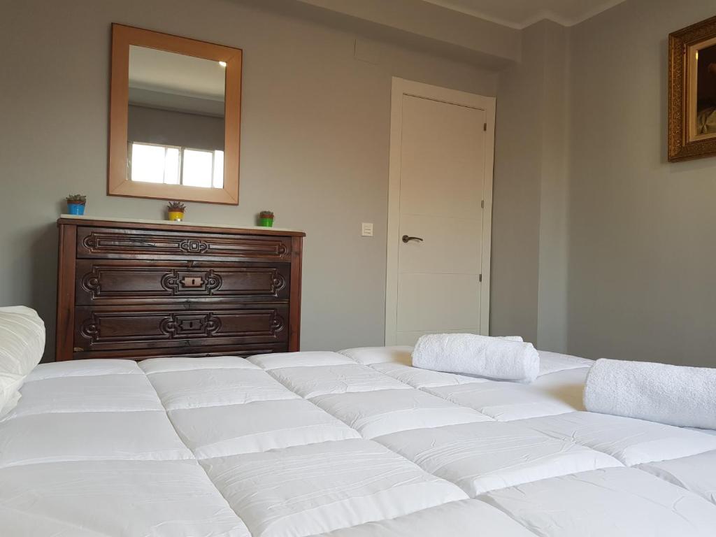 Posteľ alebo postele v izbe v ubytovaní Apartamento Centro de Granada