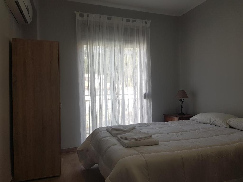 Posteľ alebo postele v izbe v ubytovaní Apartamento Centro de Granada