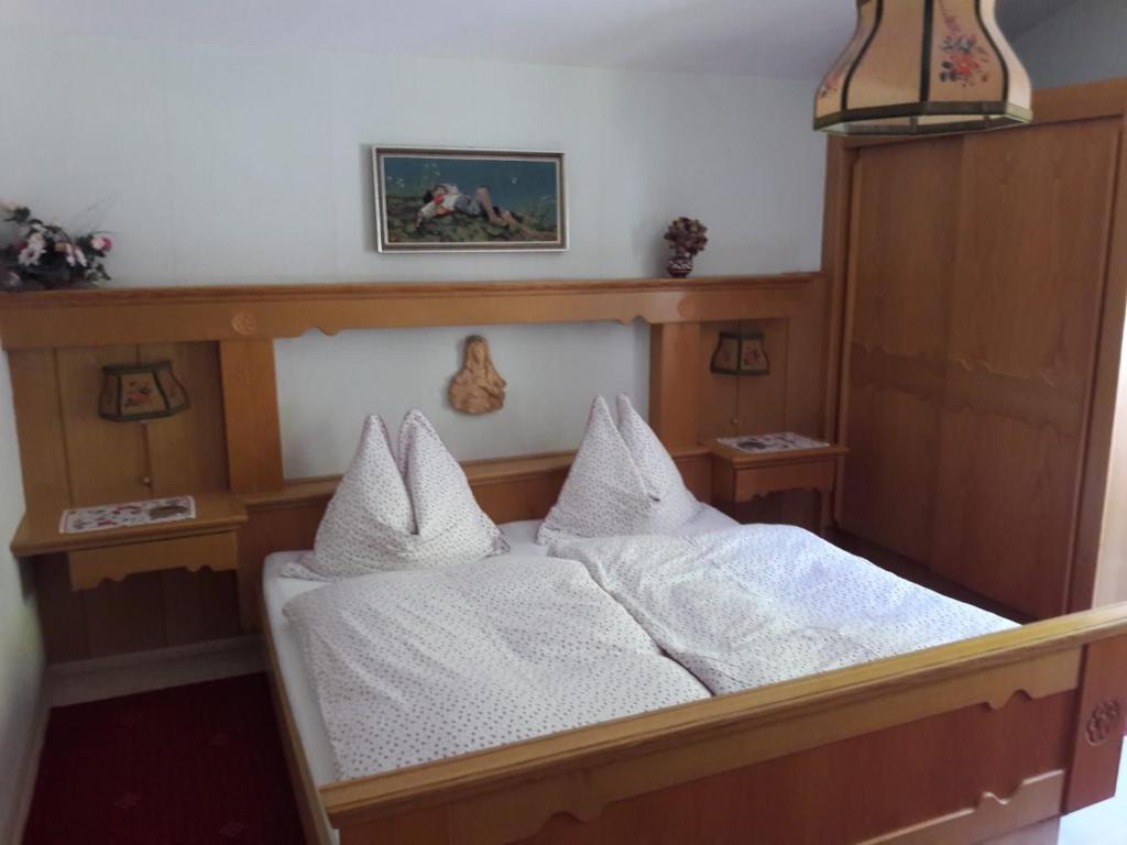 Postel nebo postele na pokoji v ubytování Haus Hauser