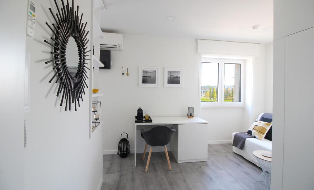 Posezení v ubytování JR Studios & Suites I Rius I