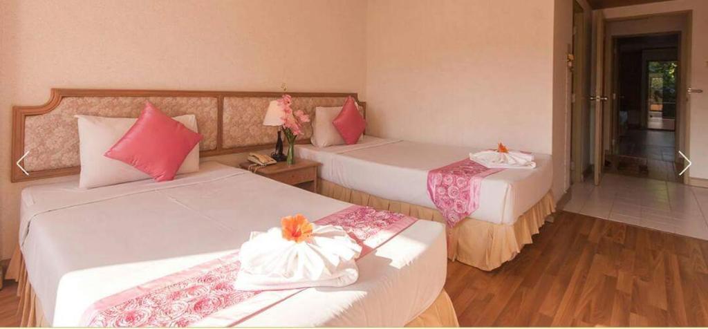Postel nebo postele na pokoji v ubytování Takiab Beach Resort