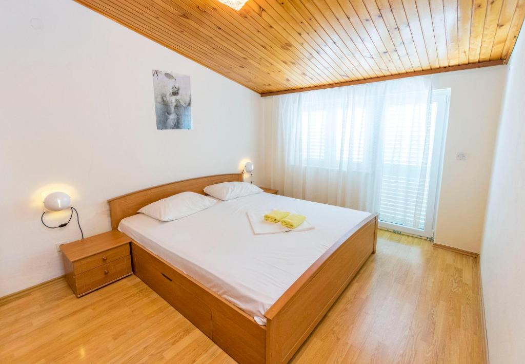 Posteľ alebo postele v izbe v ubytovaní Apartments Jere Proto