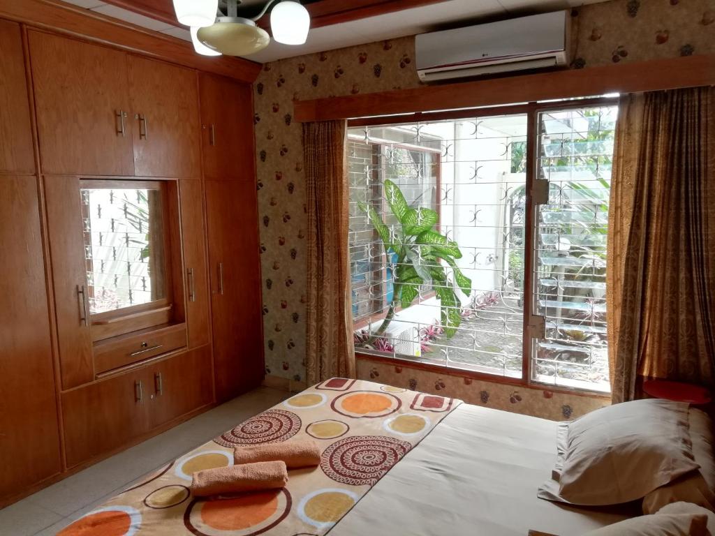 Voodi või voodid majutusasutuse GIO Guesthouse Bogor toas
