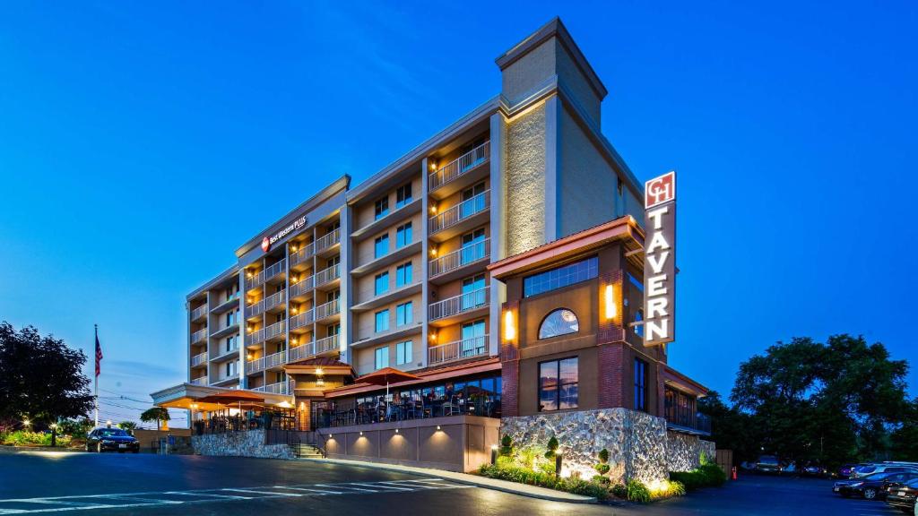 a rendering of a hotel building at night at Best Western Plus Waltham Boston in Waltham