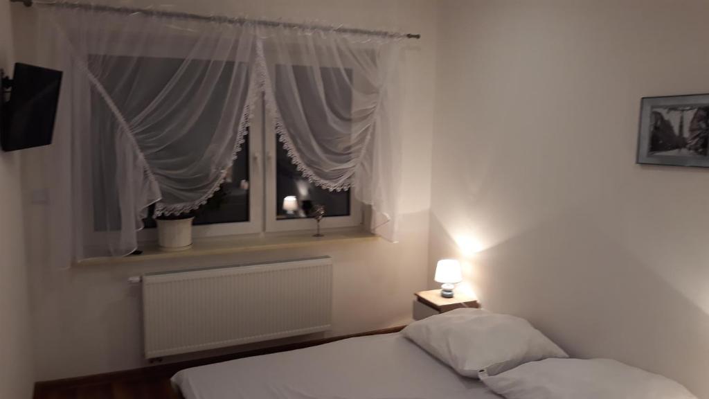 Łóżko lub łóżka w pokoju w obiekcie Vasco