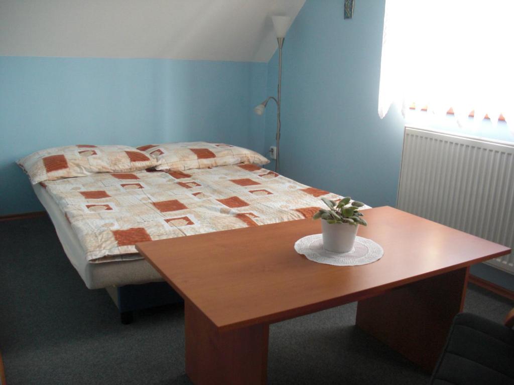 Postel nebo postele na pokoji v ubytování Pension Olga