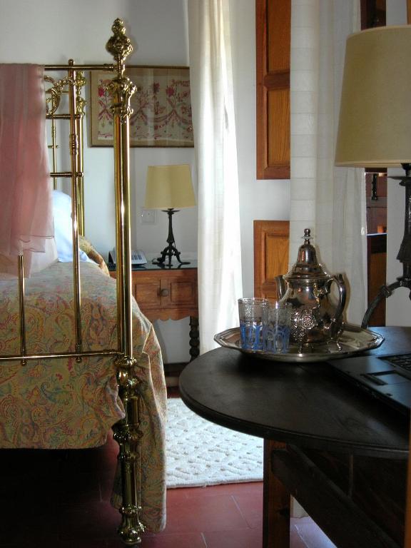 Postel nebo postele na pokoji v ubytování Hotel Santa Isabel La Real