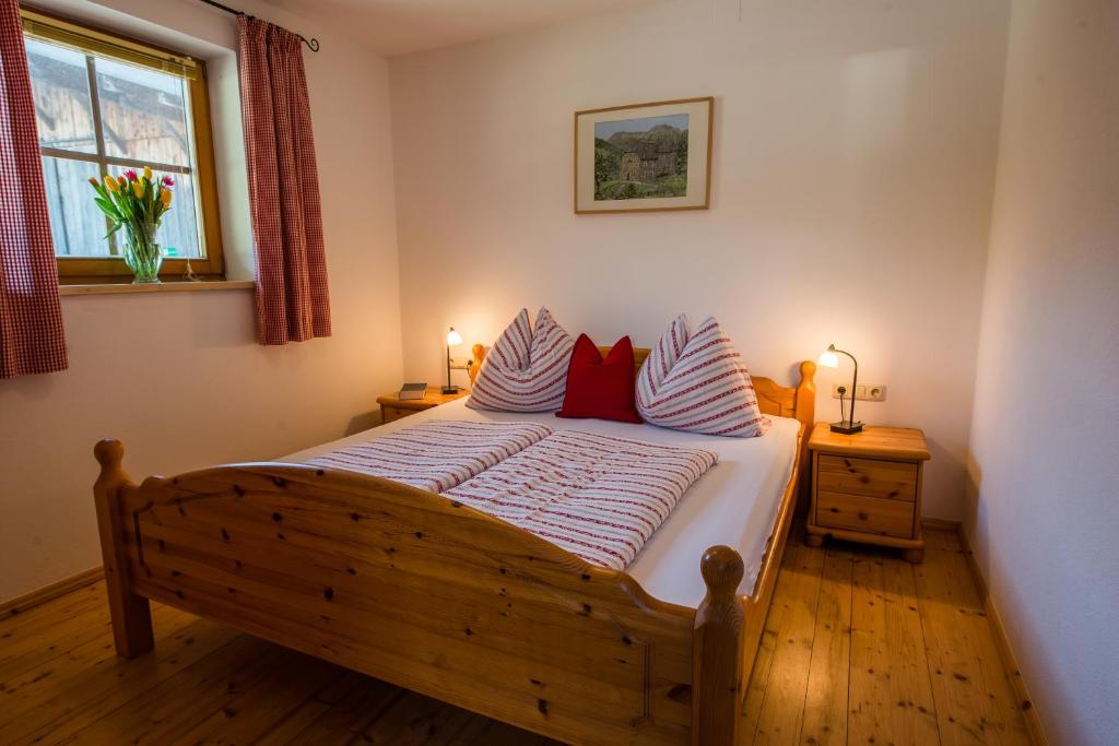 Postel nebo postele na pokoji v ubytování Apartment Bauernhof Thurnummerstall