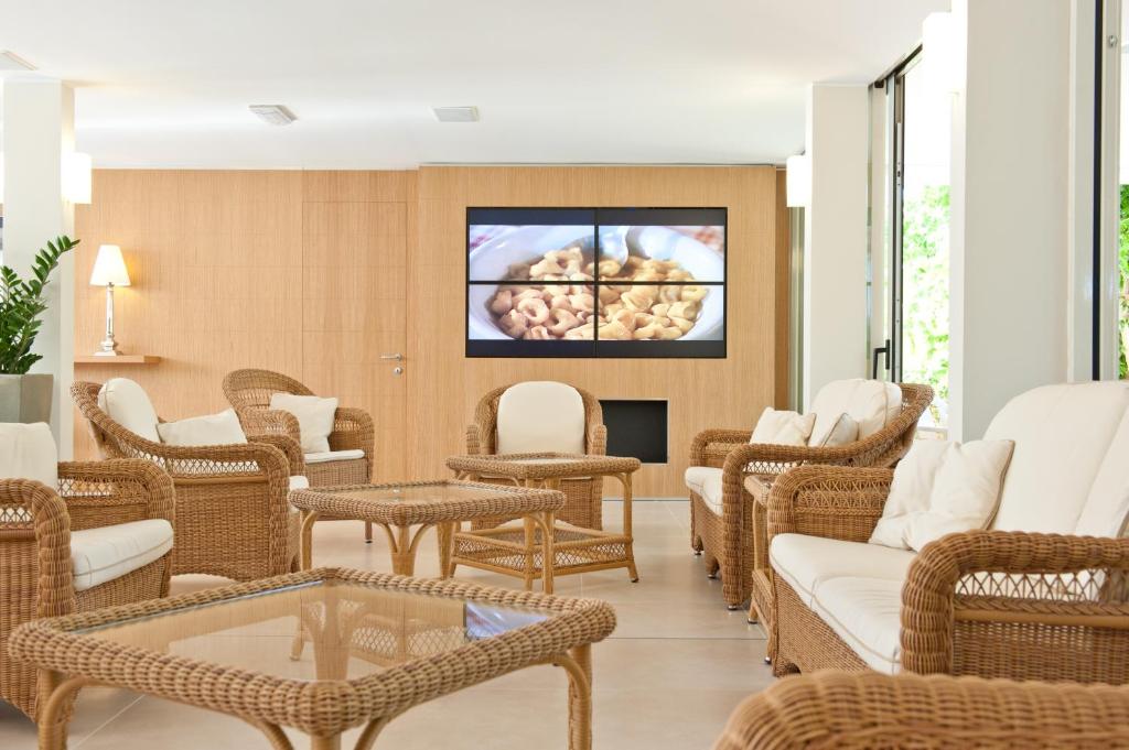 TV a/nebo společenská místnost v ubytování Hotel Derby Exclusive