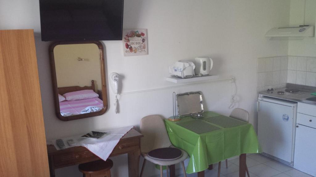 Kuchyň nebo kuchyňský kout v ubytování Eva Apartments