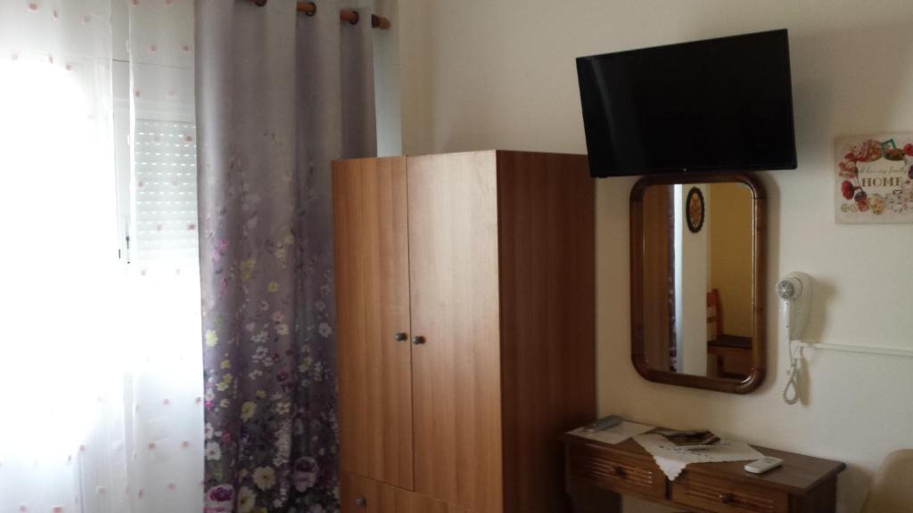 TV a/nebo společenská místnost v ubytování Eva Apartments