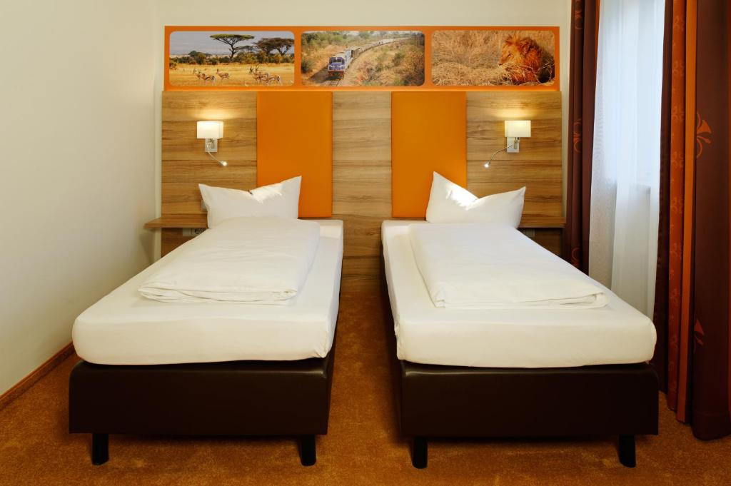 Postel nebo postele na pokoji v ubytování Hotel zur Post