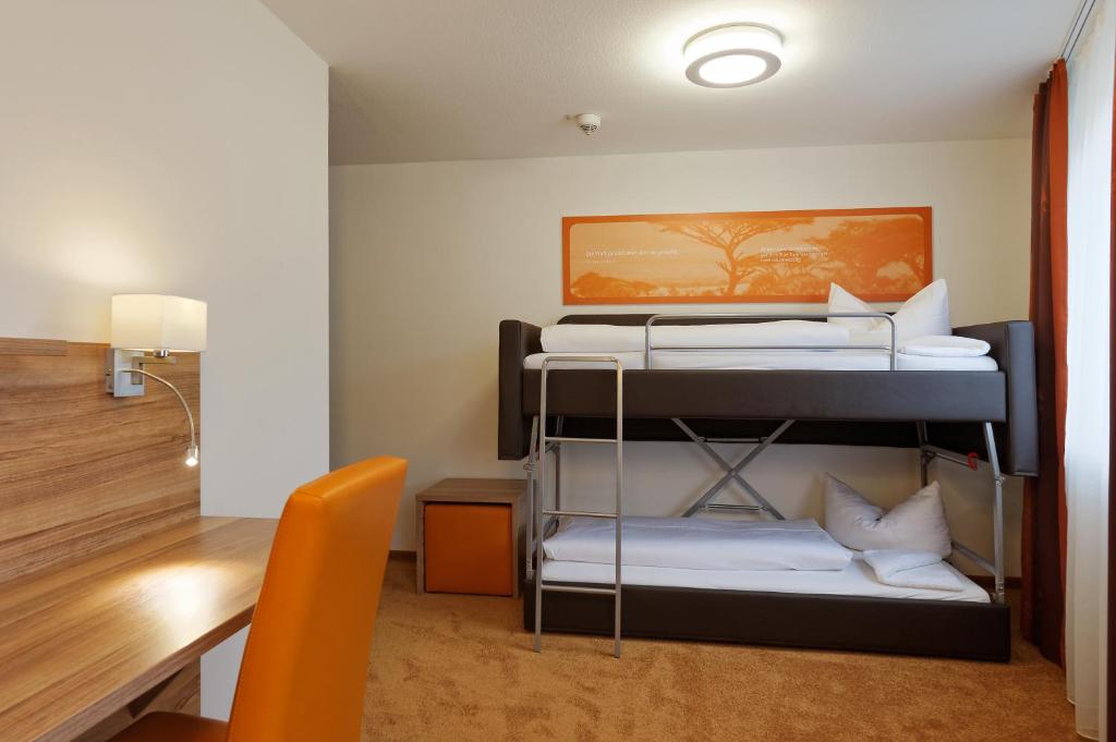 Postel nebo postele na pokoji v ubytování Hotel zur Post