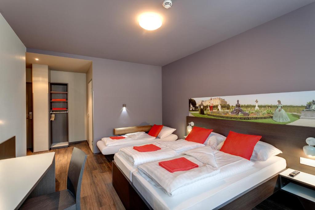 Postel nebo postele na pokoji v ubytování MEININGER Hotel Wien Downtown Sissi