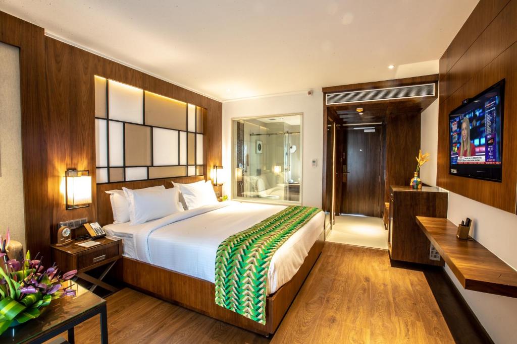 Postel nebo postele na pokoji v ubytování Hotel Span International