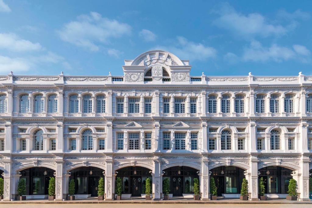 シンガポールにあるThe Capitol Kempinski Hotel Singaporeの新古典主義建築