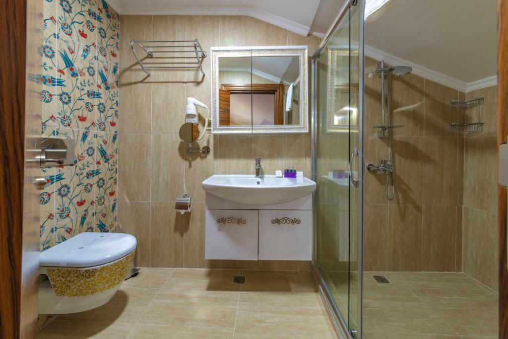 Koupelna v ubytování Vision Deluxe Hotel