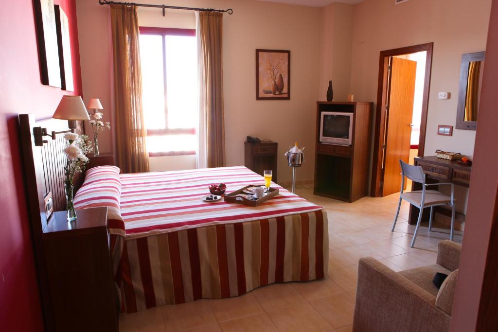 TV a/nebo společenská místnost v ubytování Hotel Rocio