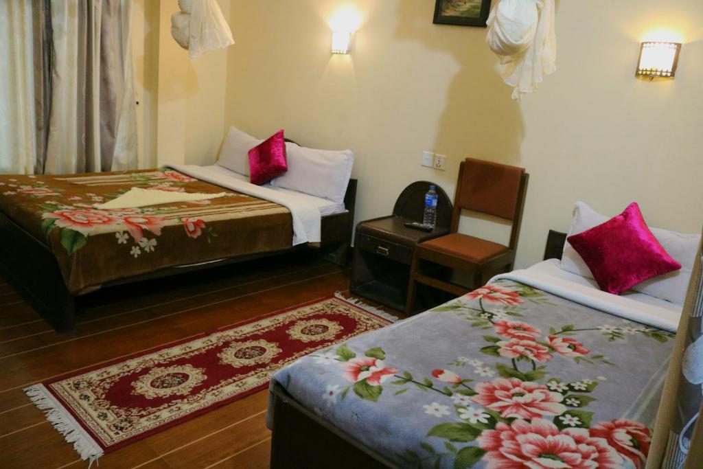Postel nebo postele na pokoji v ubytování Peacock - a family-run hotel