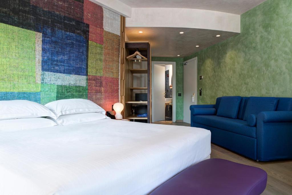Postel nebo postele na pokoji v ubytování Hotel Firenze