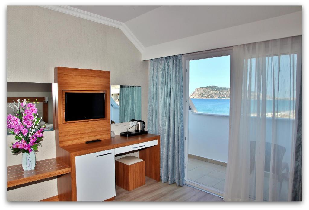 Kuchyň nebo kuchyňský kout v ubytování Mesut Hotel