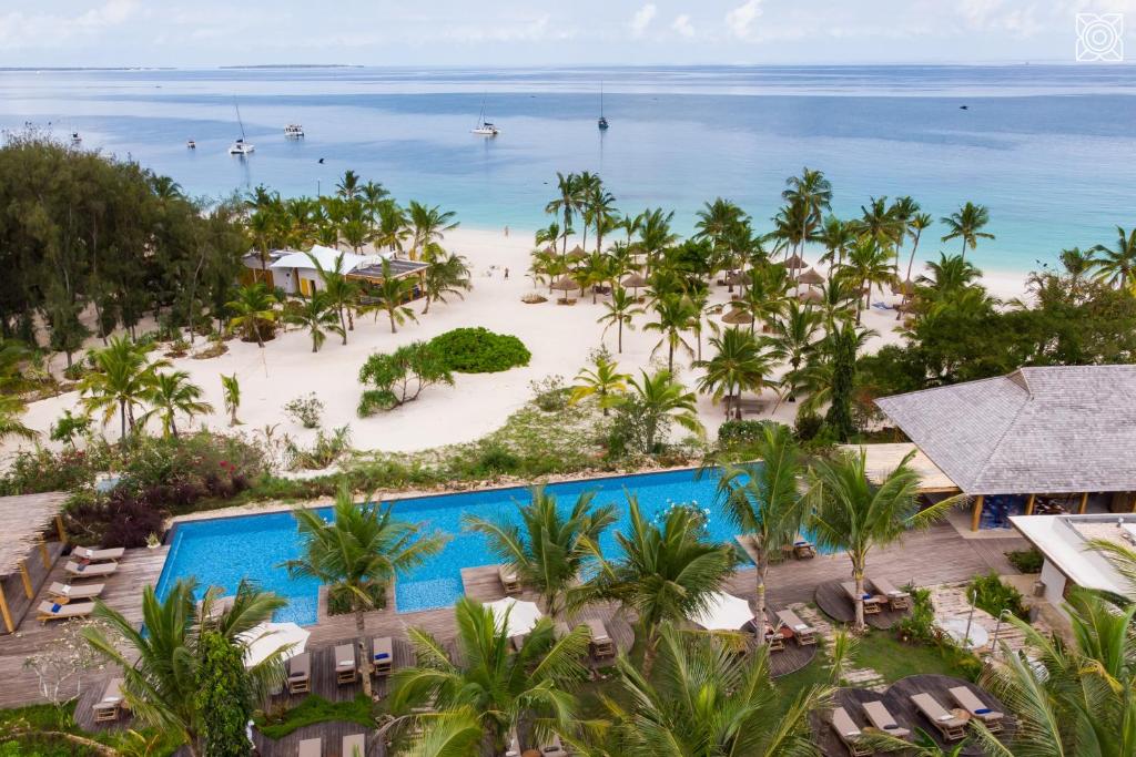 an aerial view of the beach and pool at the resort at Zuri Zanzibar in Kendwa
