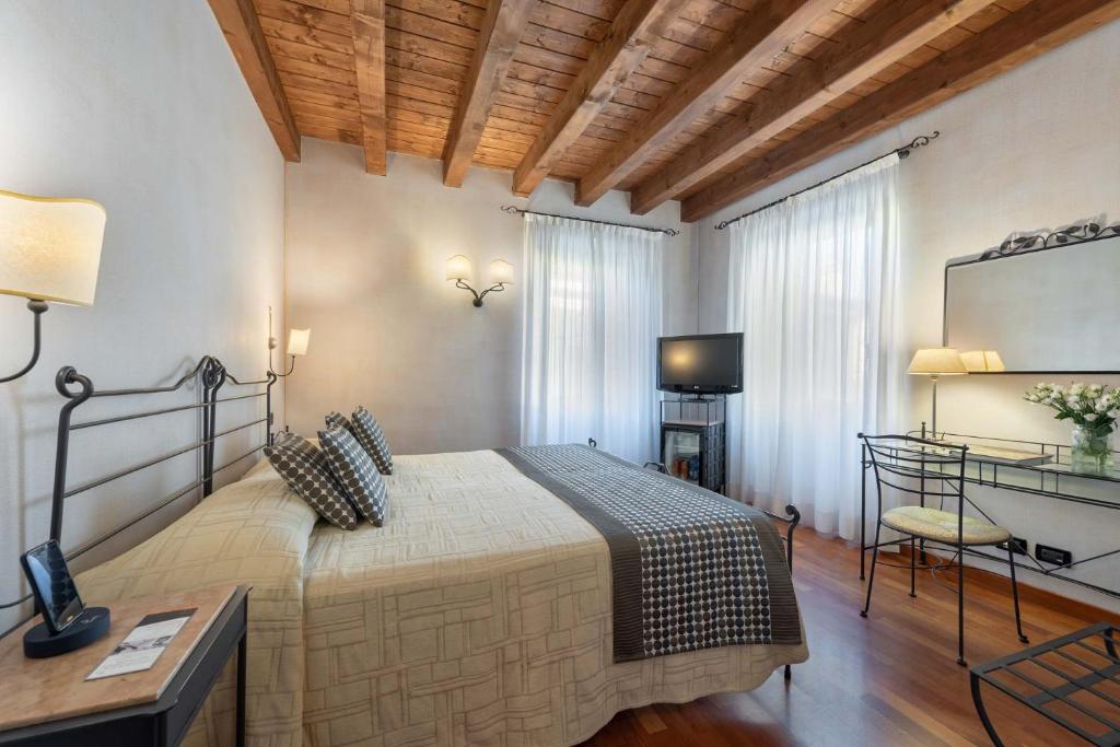 TV a/nebo společenská místnost v ubytování Hotel Marco Polo