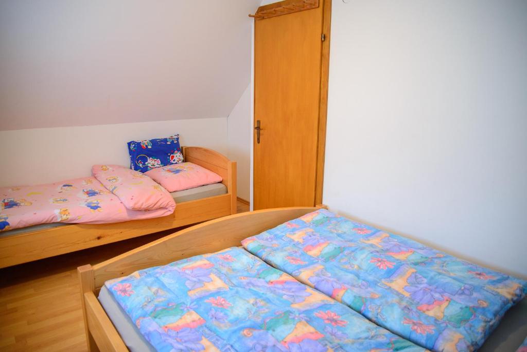 Postel nebo postele na pokoji v ubytování Holiday Home Dobrotin