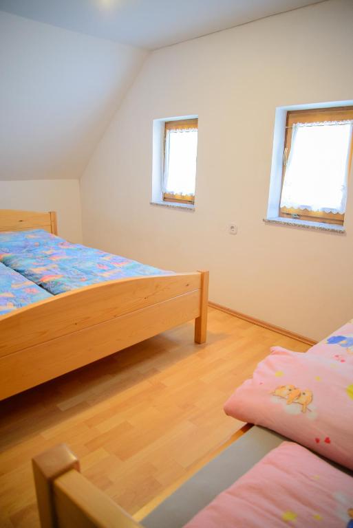 Postel nebo postele na pokoji v ubytování Holiday Home Dobrotin