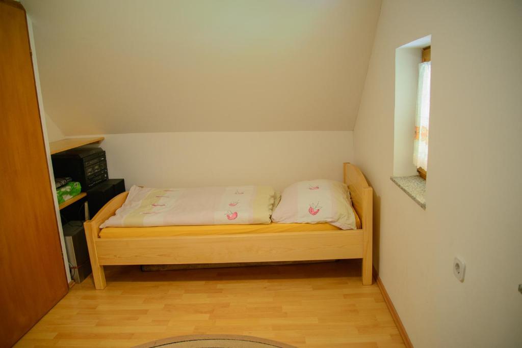 Postel nebo postele na pokoji v ubytování Holiday Home Dobrotin