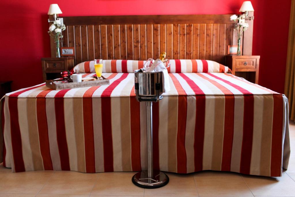 Postel nebo postele na pokoji v ubytování Hotel Rocio