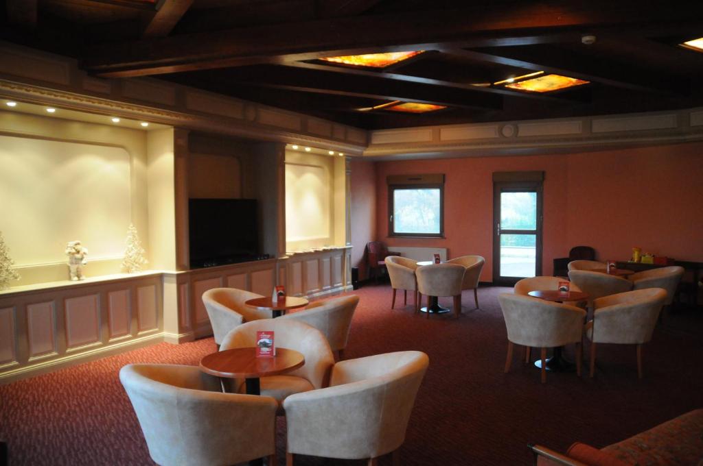 TV a/nebo společenská místnost v ubytování Hotel Cigoland