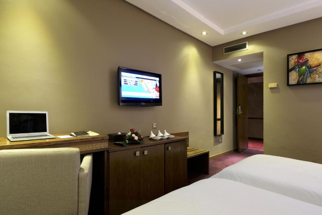 TV a/nebo společenská místnost v ubytování Belere Hotel Rabat