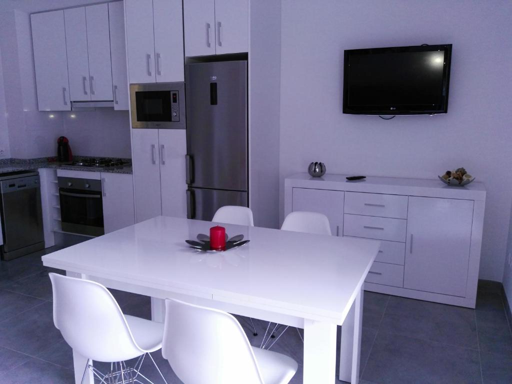 Kuchyň nebo kuchyňský kout v ubytování PRECIOSO APARTAMENTO EN PRIMERA LINEA DE MAR
