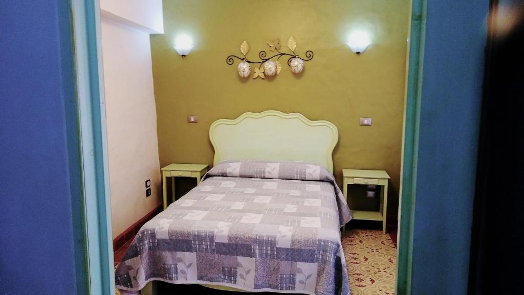 Postel nebo postele na pokoji v ubytování Posada Antiguo Camino Real