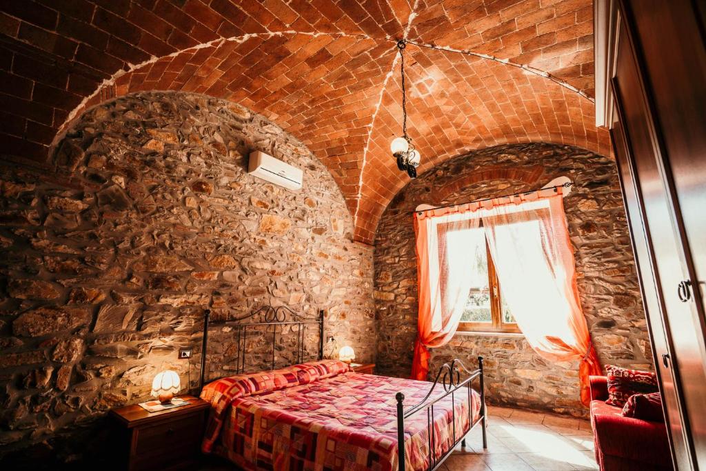 Łóżko lub łóżka w pokoju w obiekcie Casa Vacanze Ribocchi