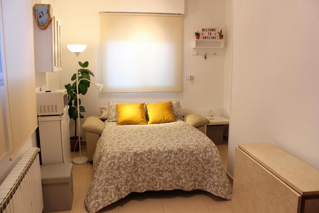 Cama o camas de una habitación en VUT Skyline