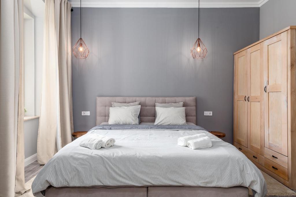 Postel nebo postele na pokoji v ubytování Karolina apartment #2