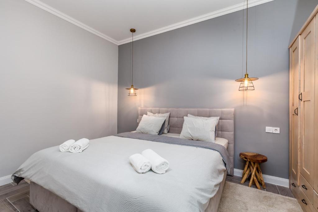 Postel nebo postele na pokoji v ubytování Karolina apartment #2